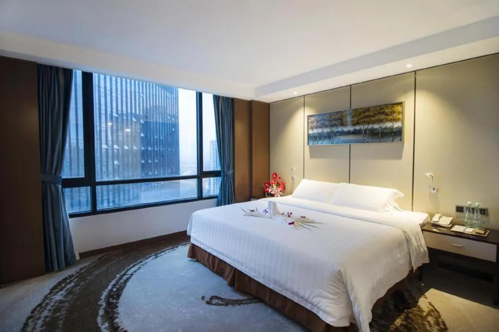 Bed in Hainan Junhua Haiyi Hotel