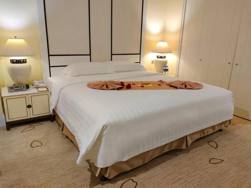 Bed in Hainan Junhua Haiyi Hotel