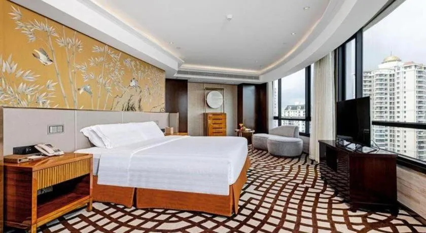 Bed in Hainan Junhua Haiyi Hotel