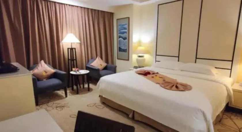 Bed in Hainan Junhua Haiyi Hotel