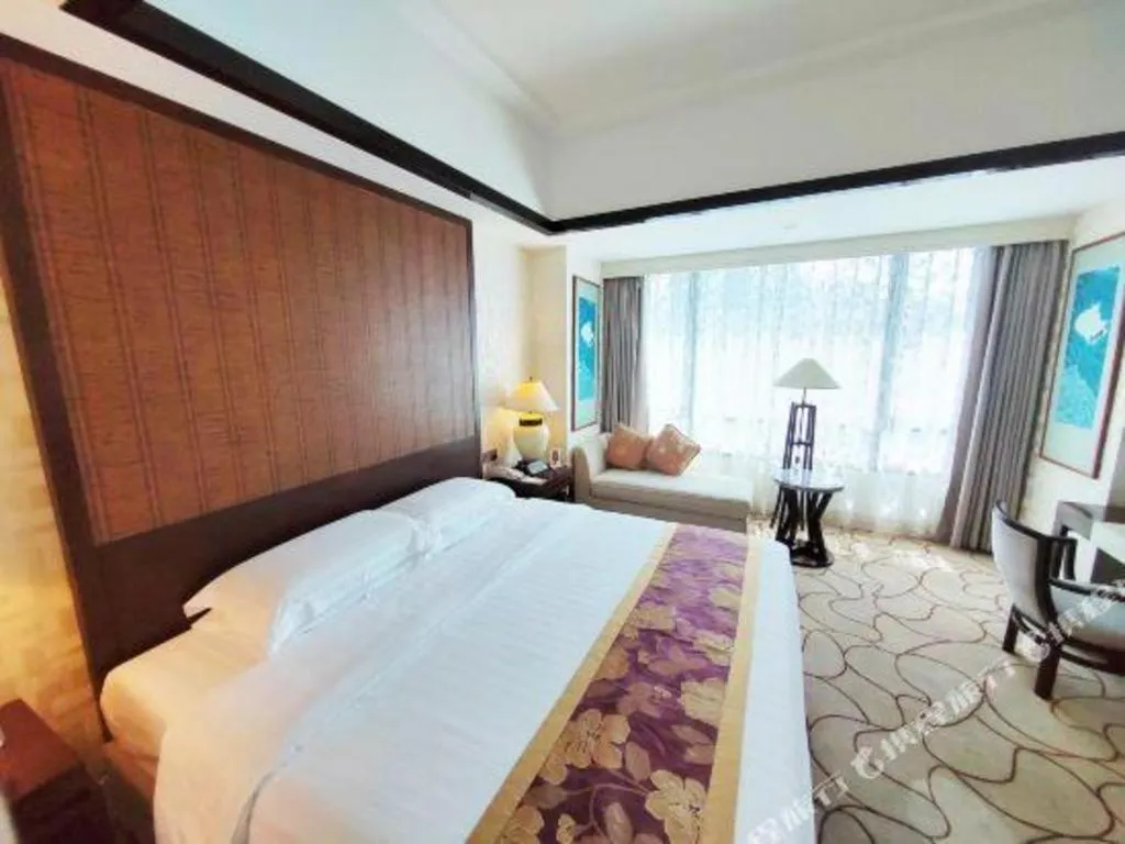 Bed in Hainan Junhua Haiyi Hotel