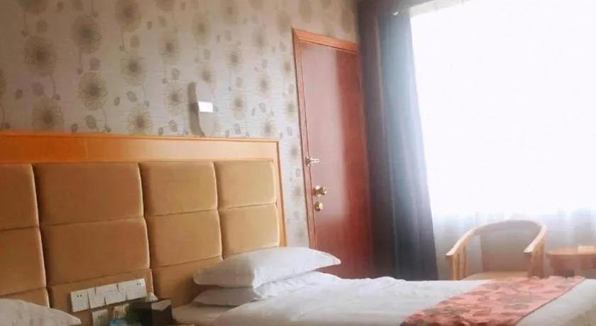 Bed in Xiamen Plaza Hotel