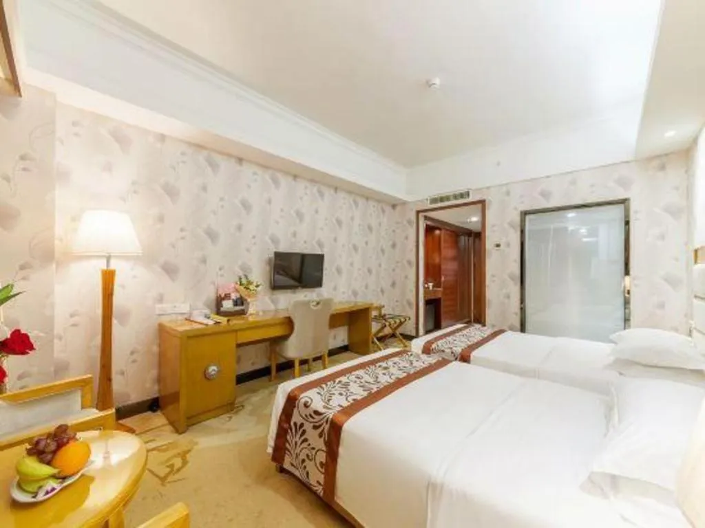 Bed in Xiamen Plaza Hotel