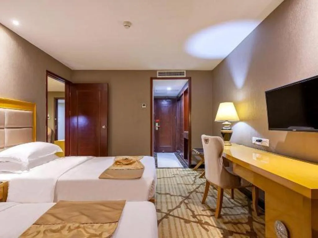 Bed in Xiamen Plaza Hotel