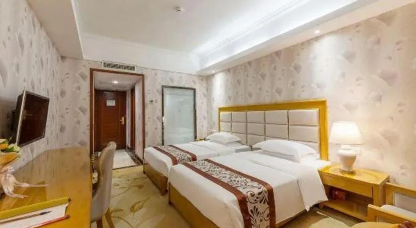 Bed in Xiamen Plaza Hotel