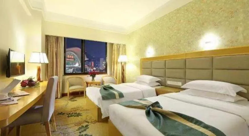 Bed in Xiamen Plaza Hotel