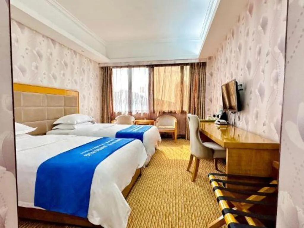 Bed in Xiamen Plaza Hotel