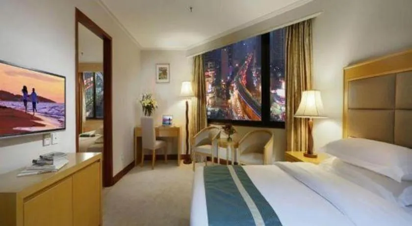 Bed in Xiamen Plaza Hotel