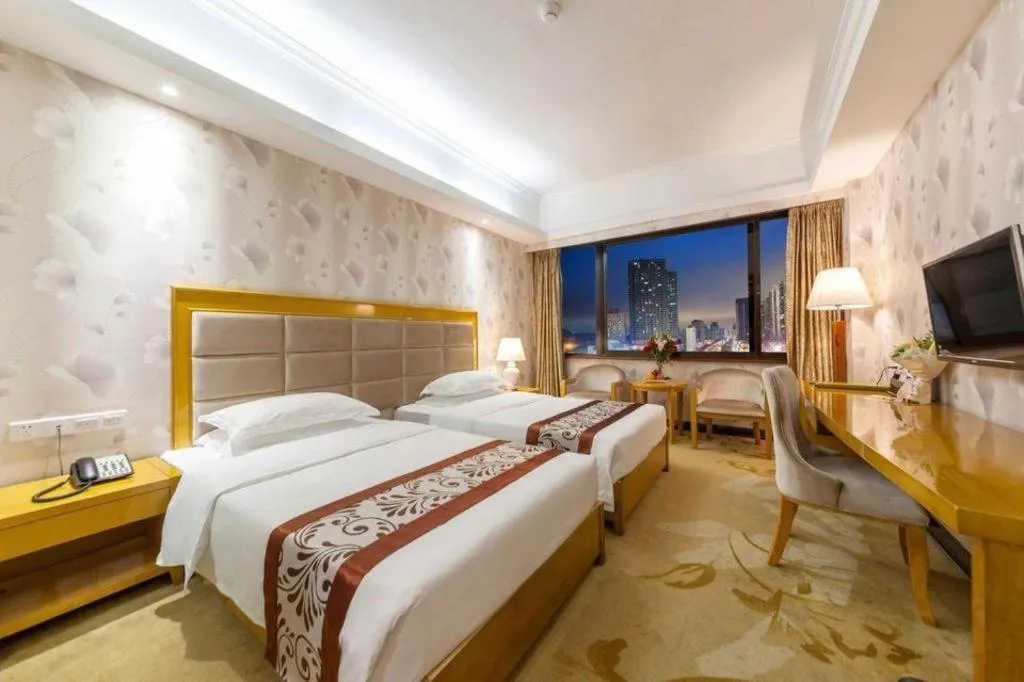 Bed in Xiamen Plaza Hotel
