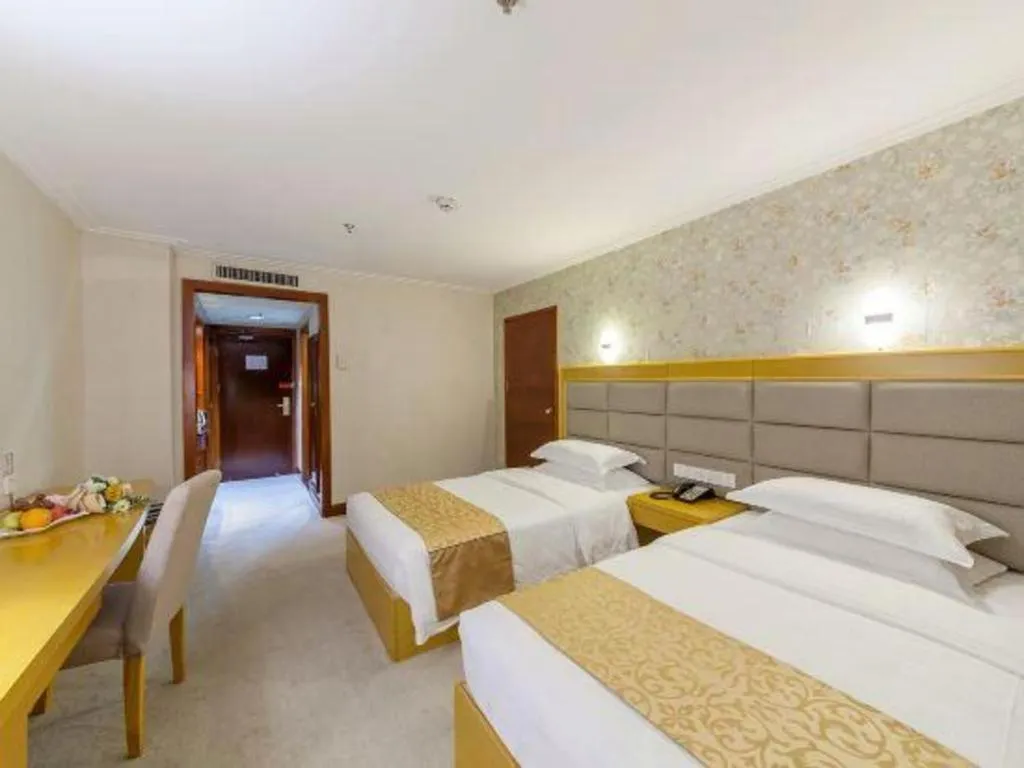 Bed in Xiamen Plaza Hotel