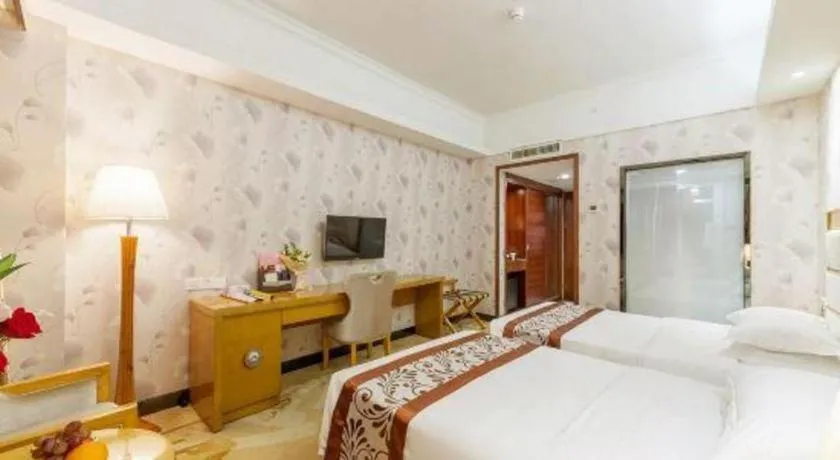 Bed in Xiamen Plaza Hotel