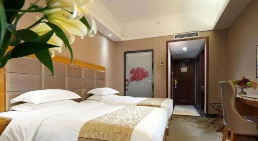 Bed in Xiamen Plaza Hotel