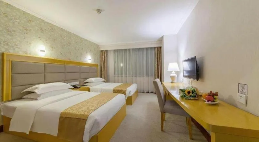 Bed in Xiamen Plaza Hotel