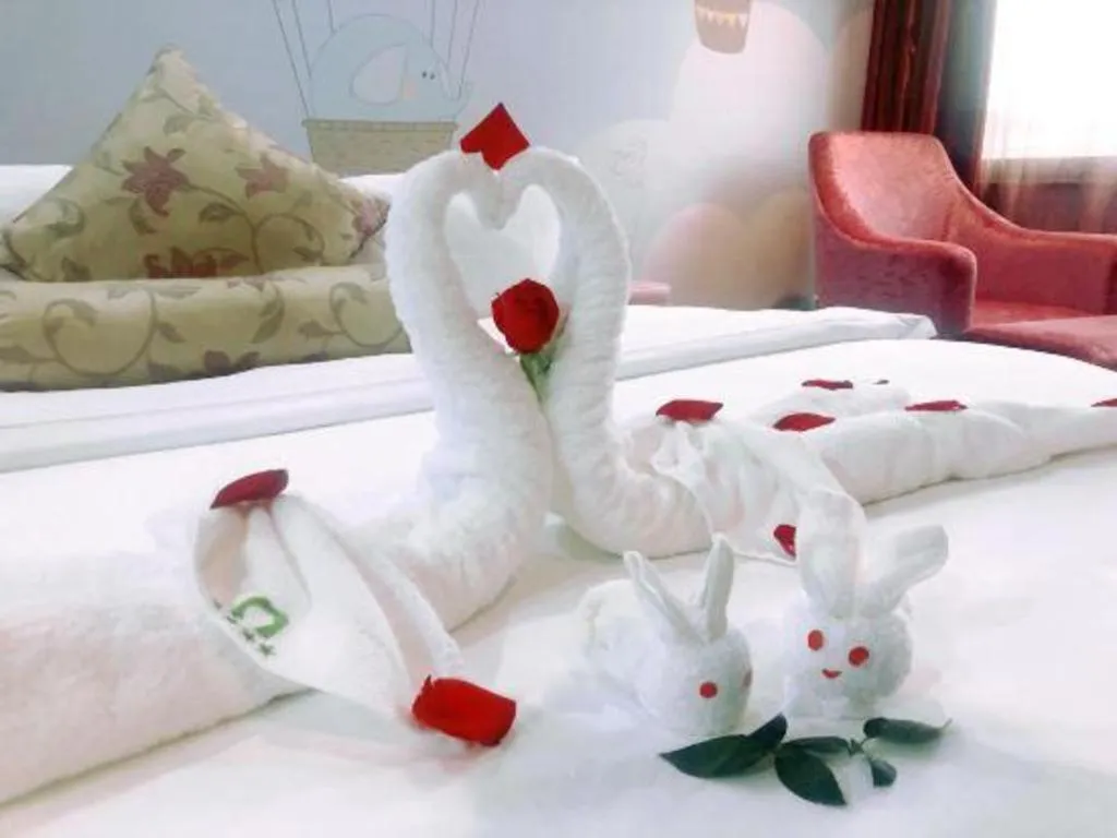 Bed in Xiamen Plaza Hotel