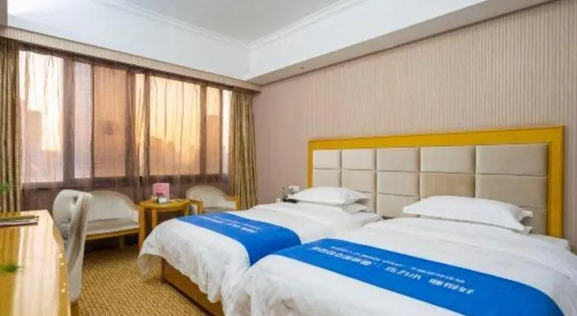 Bed in Xiamen Plaza Hotel