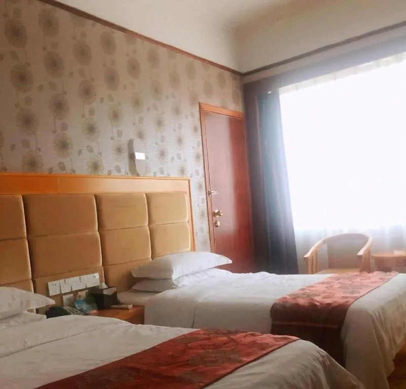 Bed in Xiamen Plaza Hotel