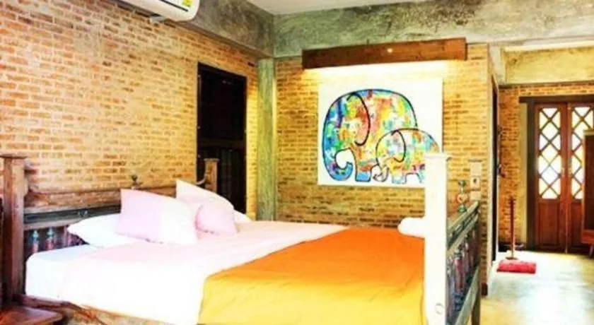 Bed in Baan Gong Kham Hotel