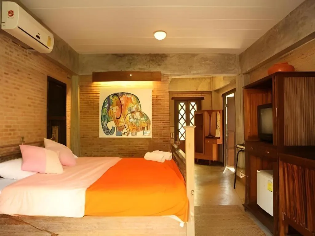 Bed in Baan Gong Kham Hotel