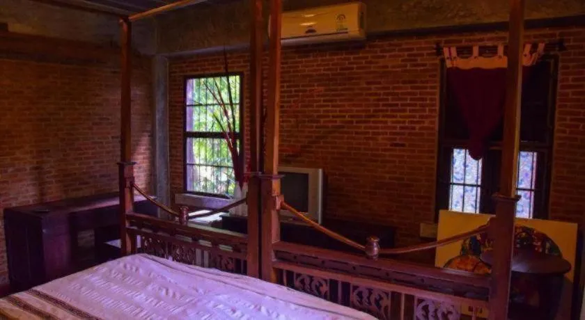 Bed in Baan Gong Kham Hotel