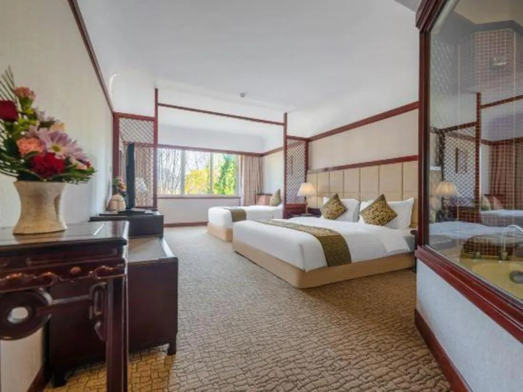 Bed in Wonderport International Hotel