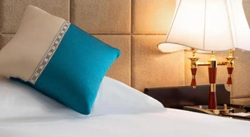 Bed in Wonderport International Hotel