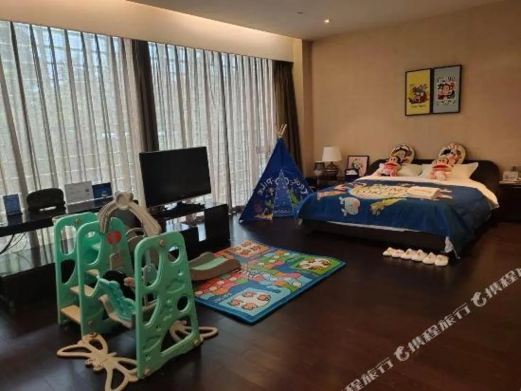 Bed in Hotel Kapok Wangfujing