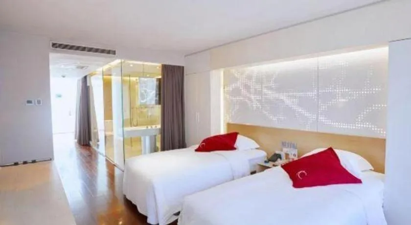 Bed in Hotel Kapok Wangfujing