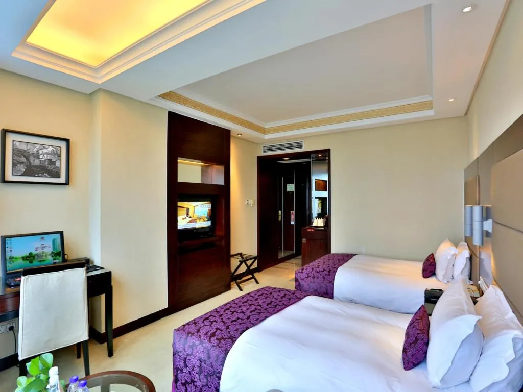 Bed in Yiwu Yimei Plaza Hotel