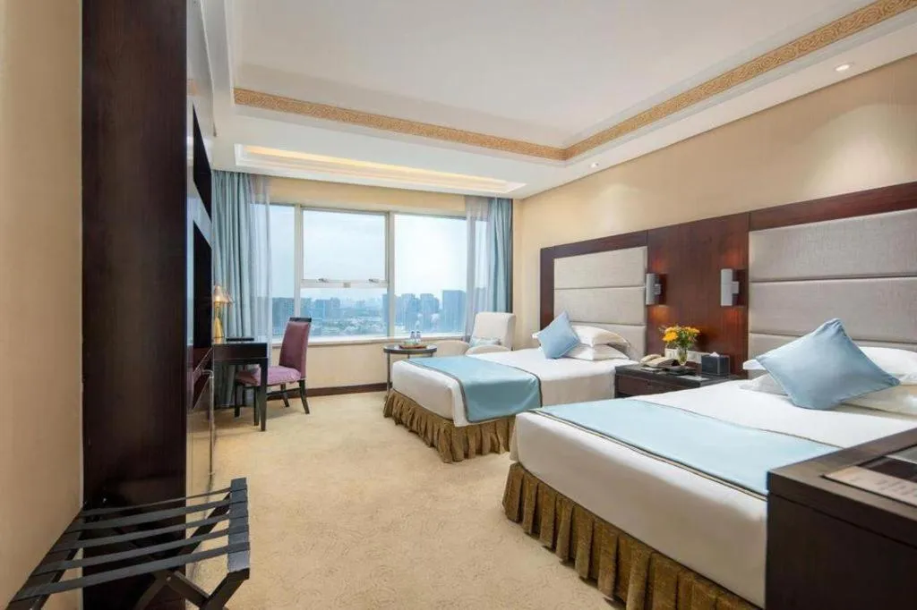 Bed in Yiwu Yimei Plaza Hotel