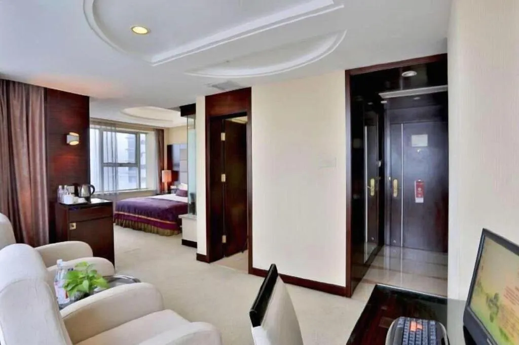 Bed in Yiwu Yimei Plaza Hotel