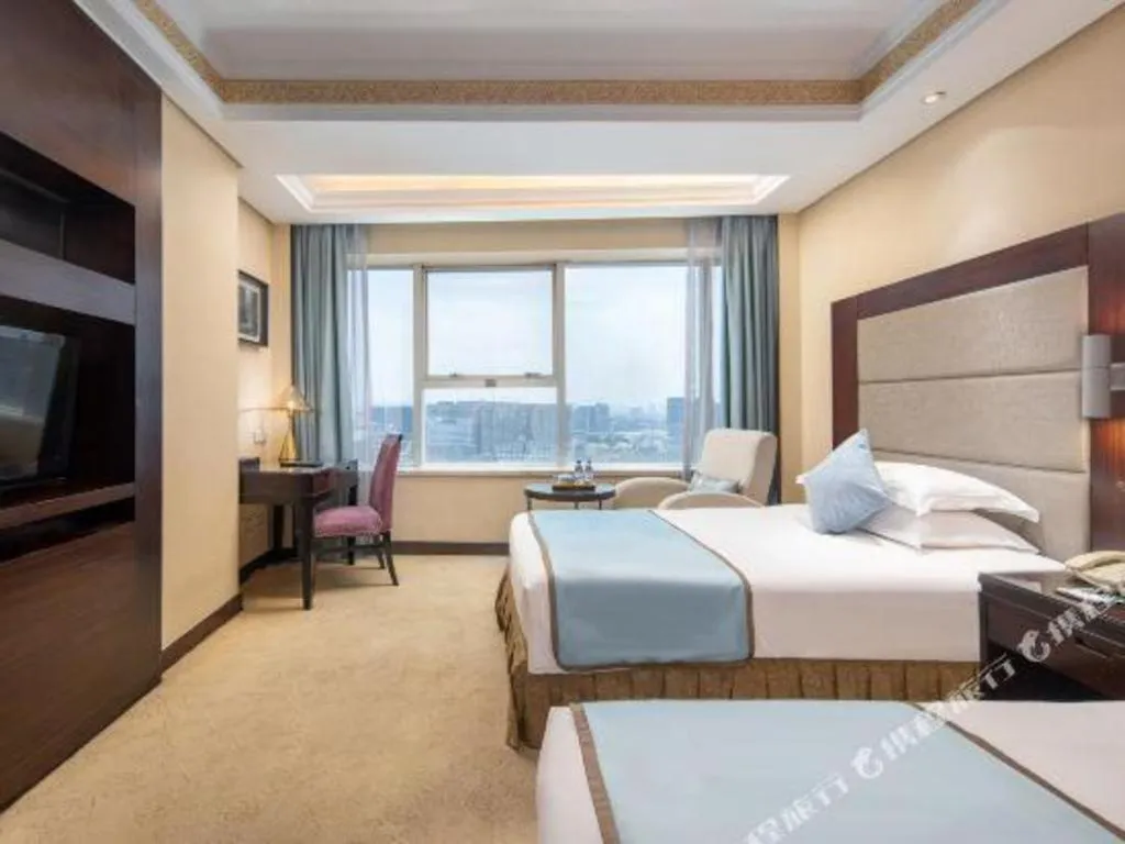 Bed in Yiwu Yimei Plaza Hotel