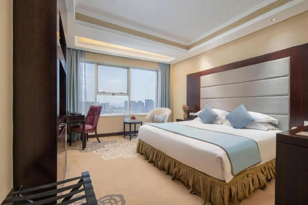 Bed in Yiwu Yimei Plaza Hotel