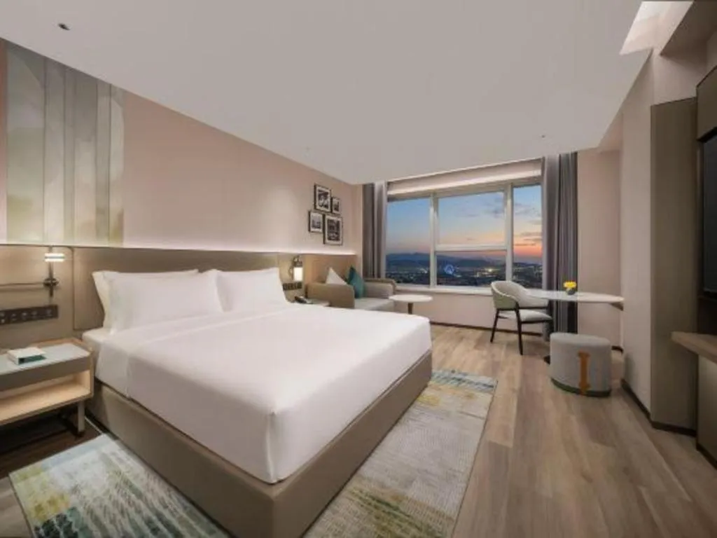 Bed in Yiwu Yimei Plaza Hotel