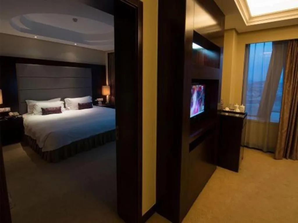 Bed in Yiwu Yimei Plaza Hotel