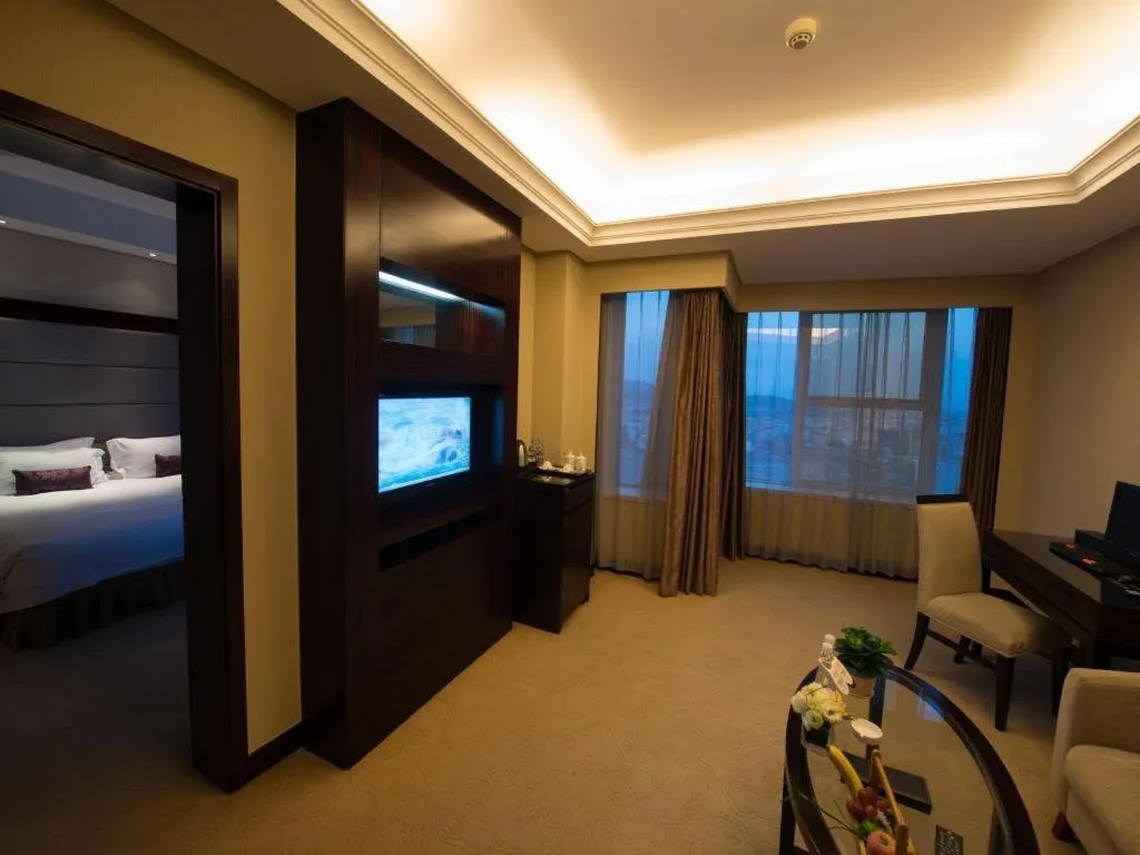 Bed in Yiwu Yimei Plaza Hotel