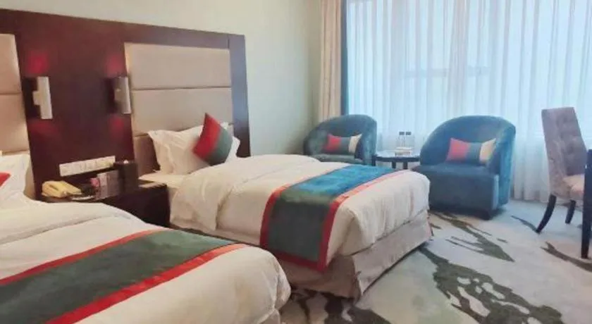 Bed in Yiwu Yimei Plaza Hotel