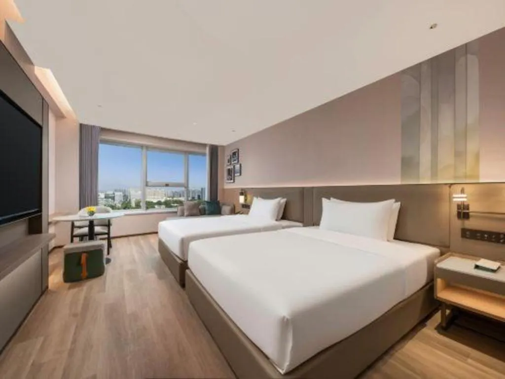 Bed in Yiwu Yimei Plaza Hotel