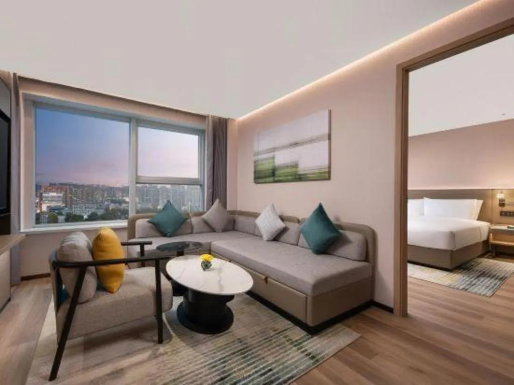 Bed in Yiwu Yimei Plaza Hotel