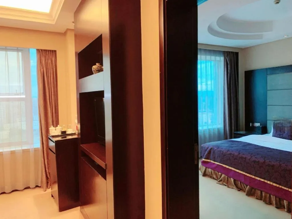 Bed in Yiwu Yimei Plaza Hotel