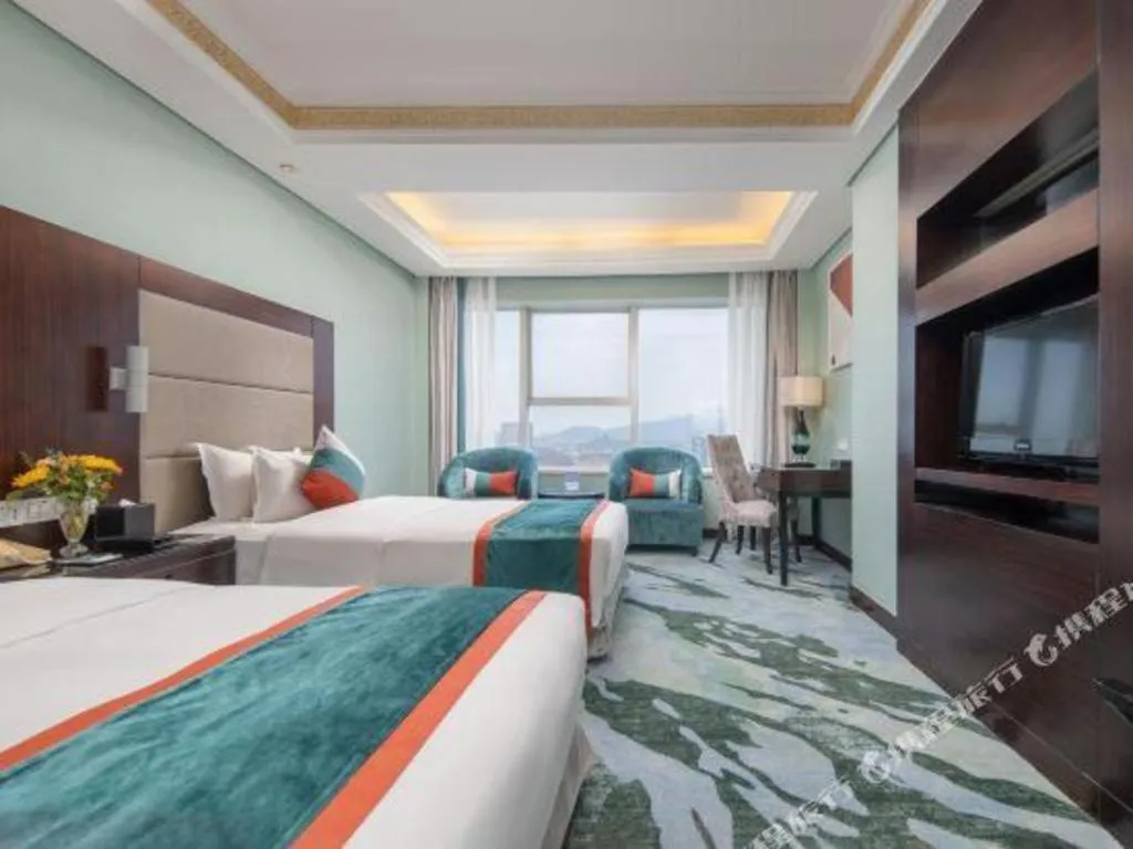 Bed in Yiwu Yimei Plaza Hotel