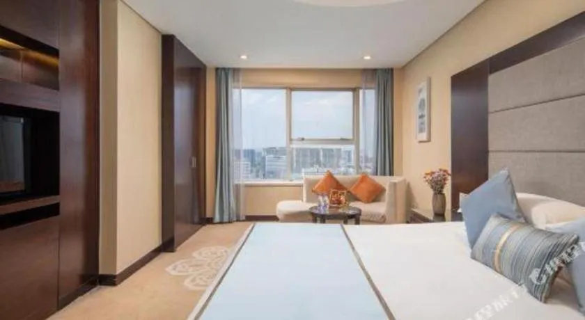 Bed in Yiwu Yimei Plaza Hotel