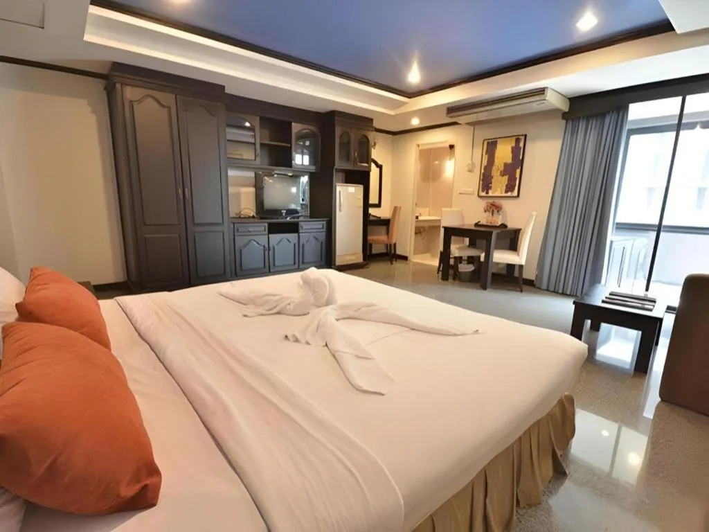 Bed in The Heritage Sathorn Suite Hotel