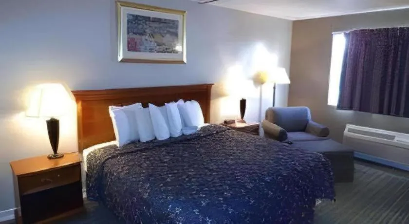 Bed in Days Inn by Wyndham West Branch Iowa City Area