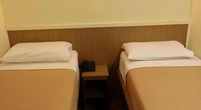 Bed in Arianna Hotel