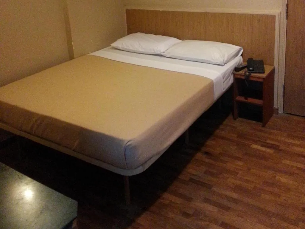 Bed in Arianna Hotel