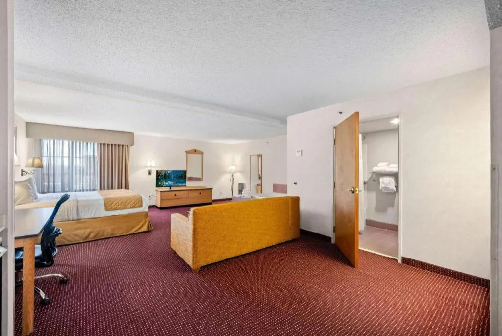 Bed in AmericInn by Wyndham Denver Airport