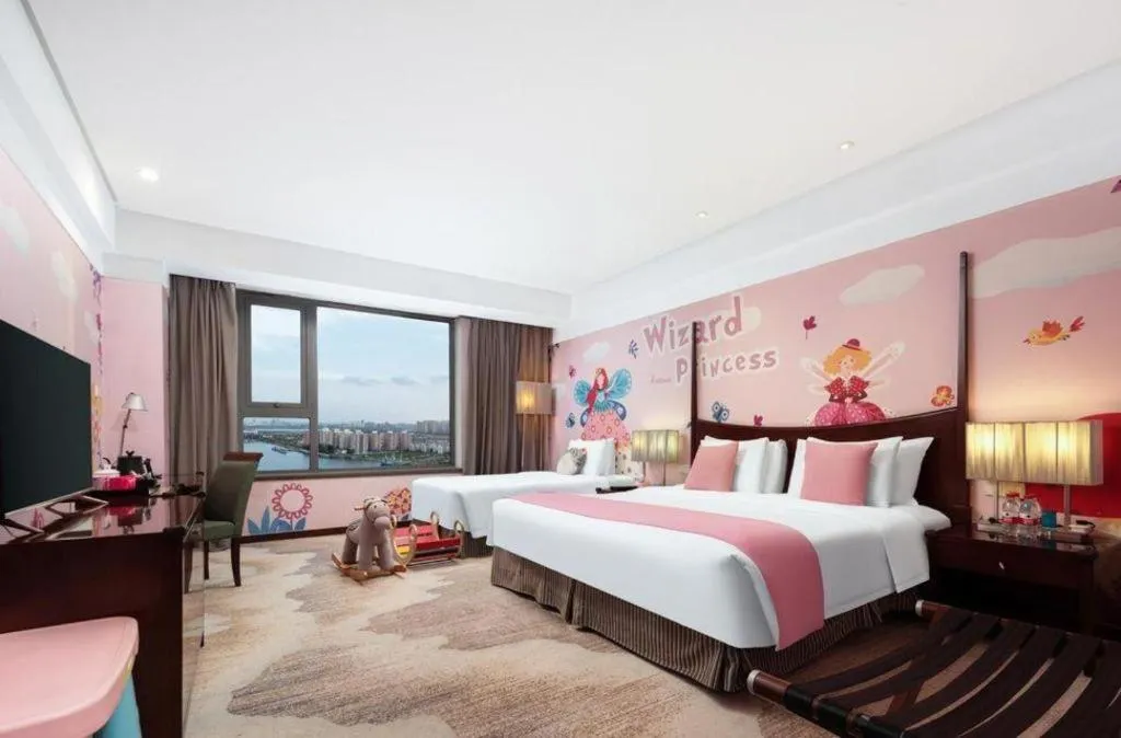 Bed in Grand New Century Hotel Binhai Tianjin