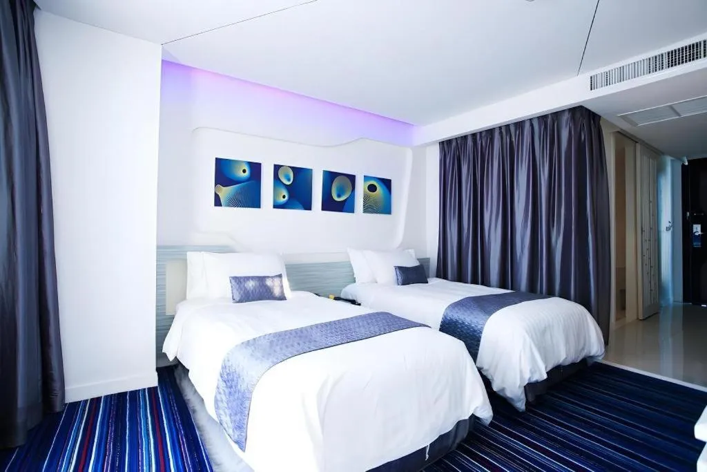 Bed in Glacier Hotel Khon Kaen