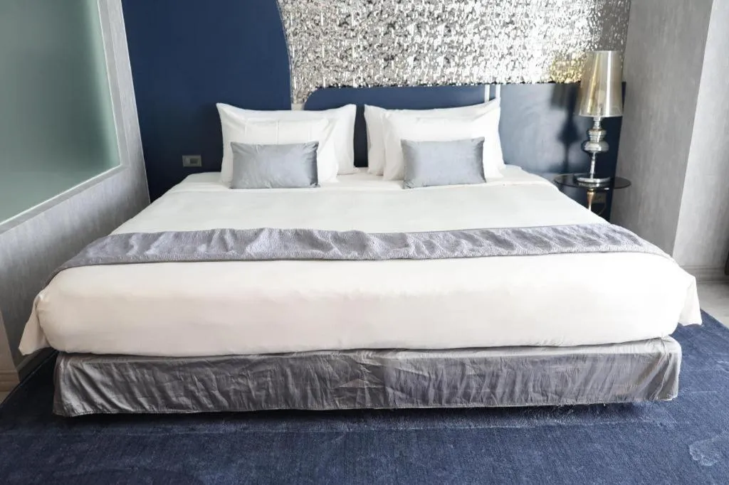 Bed in Glacier Hotel Khon Kaen