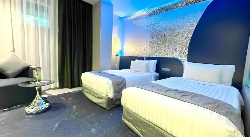 Bed in Glacier Hotel Khon Kaen